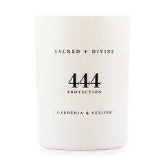 Sacred + Divine 444 protection candle in gardenia-vetiver jar for calm focus.