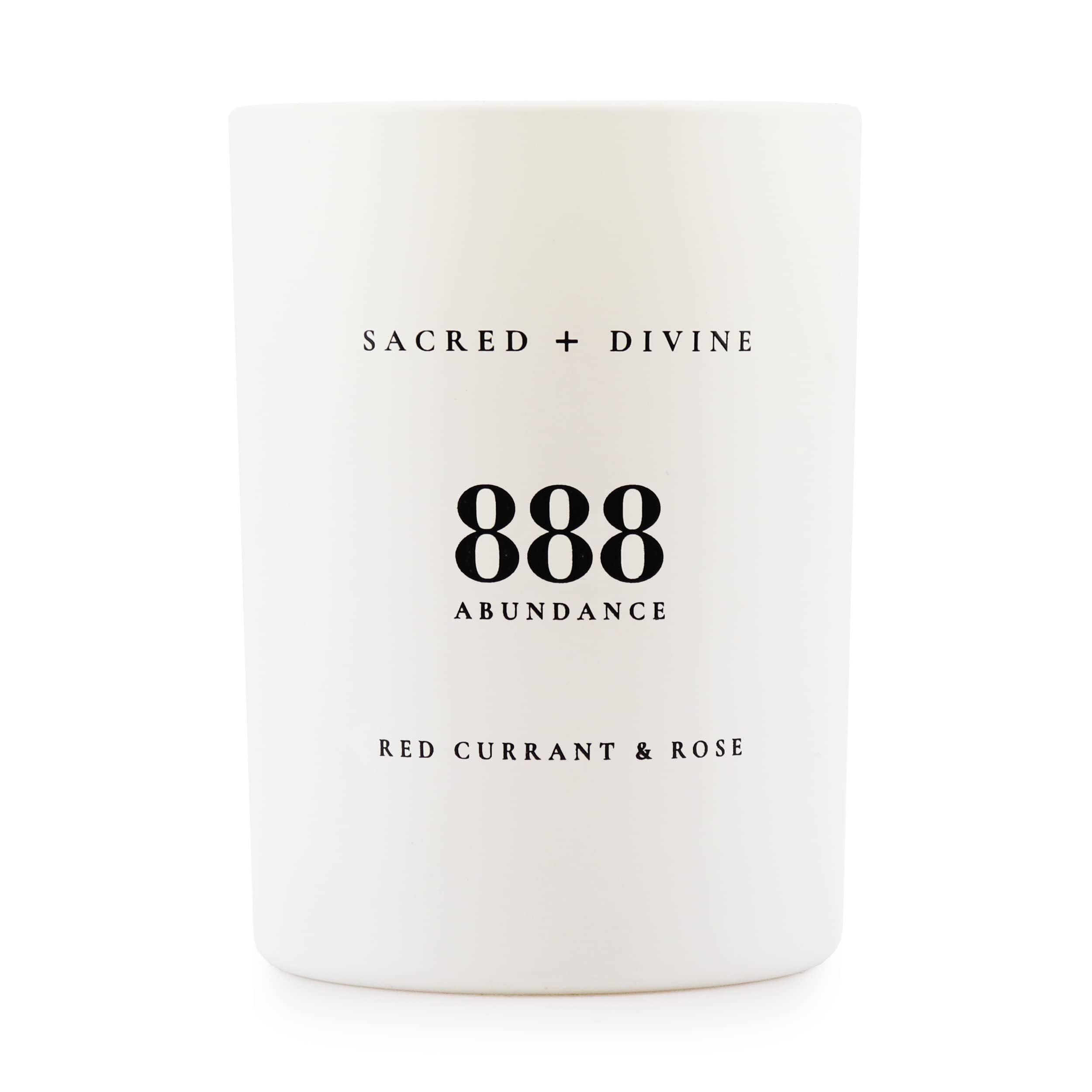 Sacred + Divine 888 abundance candle in a minimalist jar for focused intention setting.
