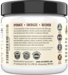 Sacred Eats Keto Electrolyte Powder dissolving in water for quick refreshment