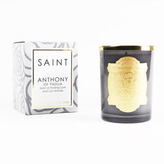 Saint Anthony padua candle reveals embedded prayer coin to keep or bless your space.