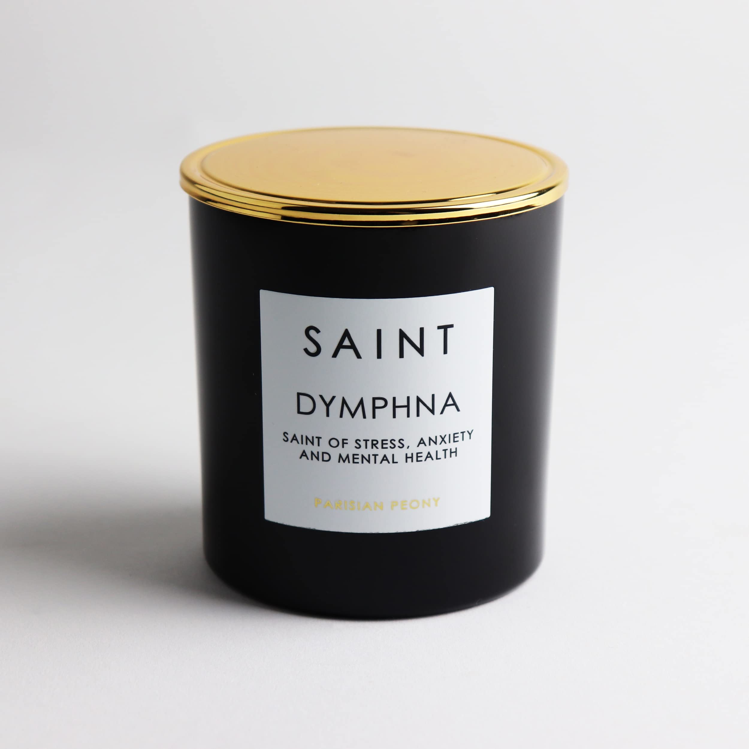 Saint Dymphna candle fragrance blends cherries and vanilla for comforting aromatics