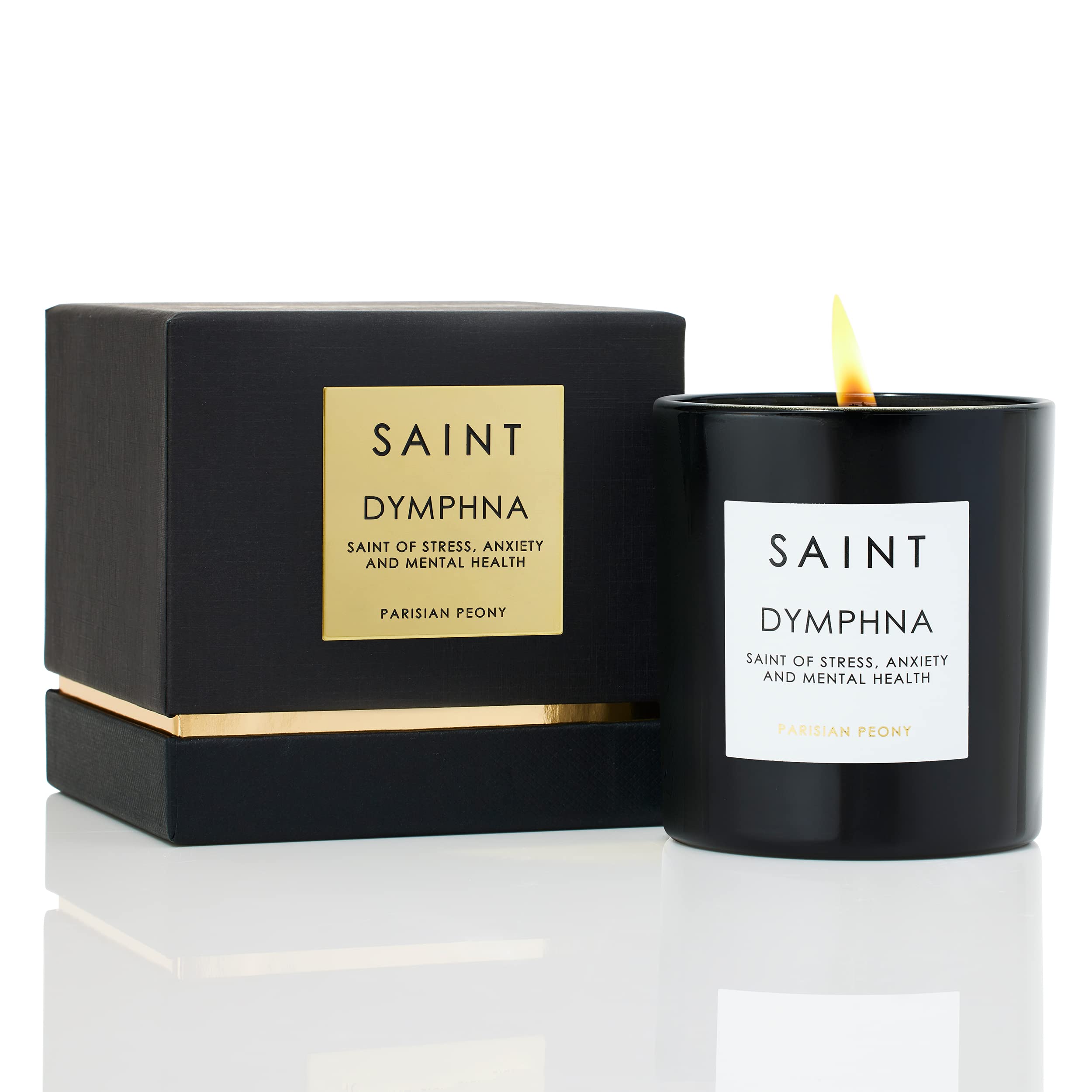 Saint Dymphna candle with embedded prayer coin close-up showcases calming focus