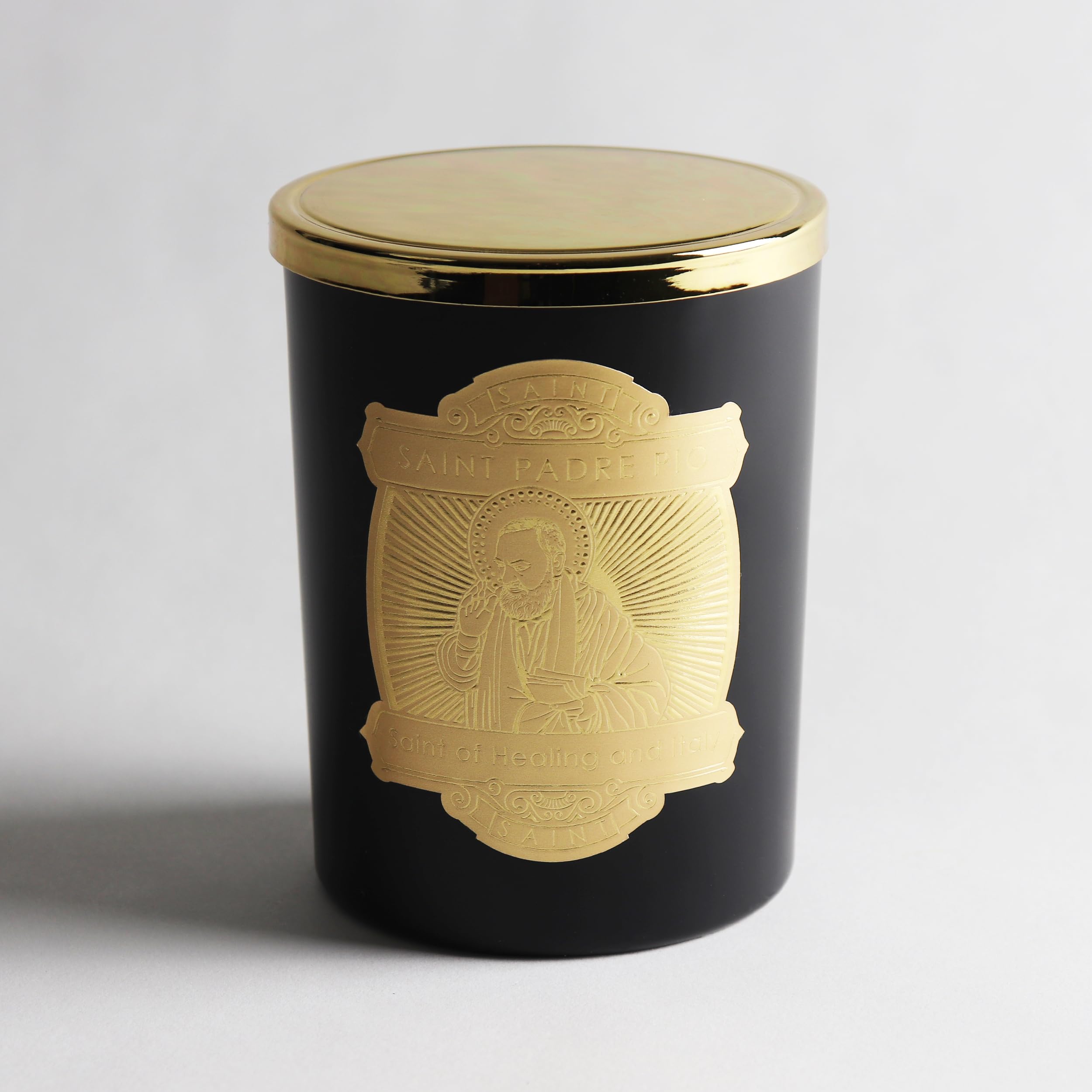 Saint Padre Pio Candle emits amber and heliotrope aroma for relaxation.