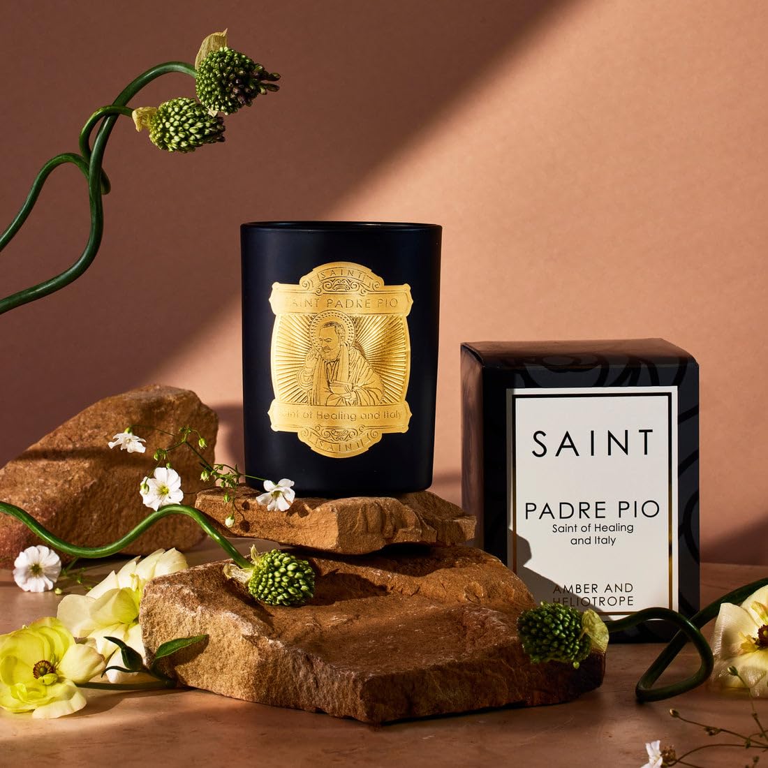 Saint Padre Pio Candle features the Italian prayer coin as a keepsake.