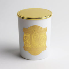 SAINT candle with visible prayer coin supports mindful rituals