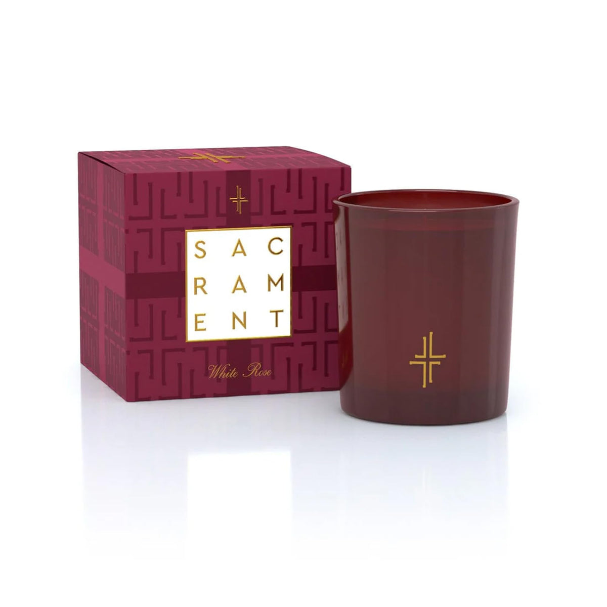 SAINT X Ali Landry Sacrament Candle in a white rose vessel for tranquil spaces.