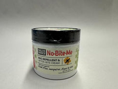 SALLYEANDER No Bite Me cream being dabbed on skin for bite relief.