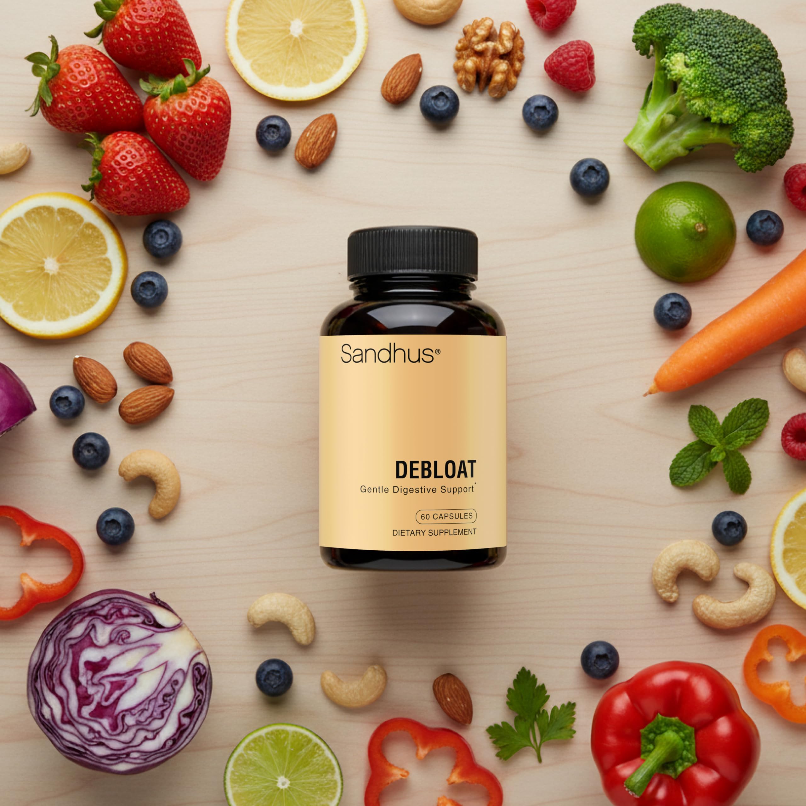 Sandhu's Debloat bottle on a counter beside a heavy meal.