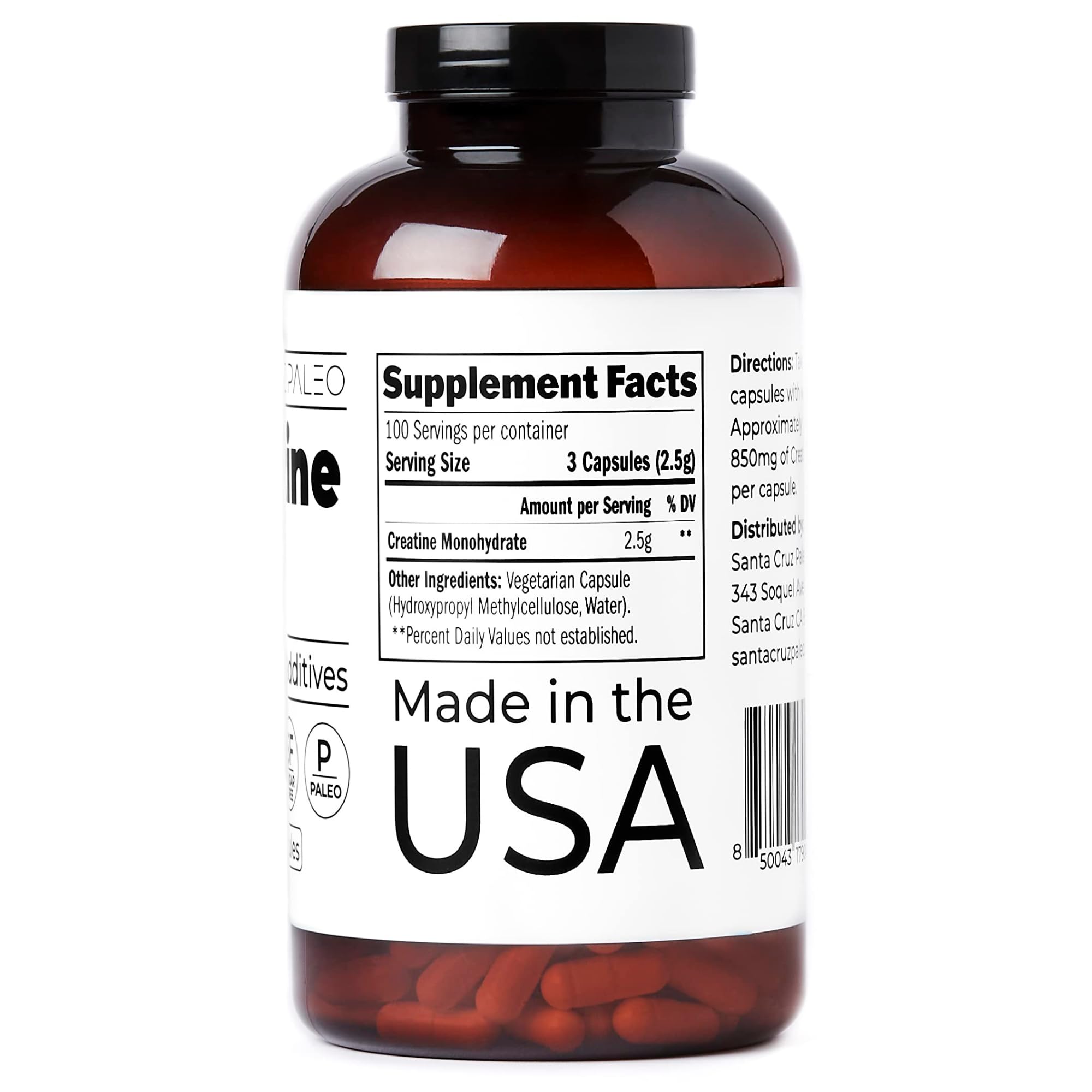 Pouring Santa Cruz Paleo Creatine Capsules from the bottle for easy dosing