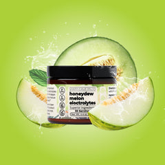 Scoop of Santa Cruz Paleo electrolyte powder showing texture for easy mixing