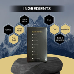 Dissolving Sarban Shilajit in warm water for easy absorption.