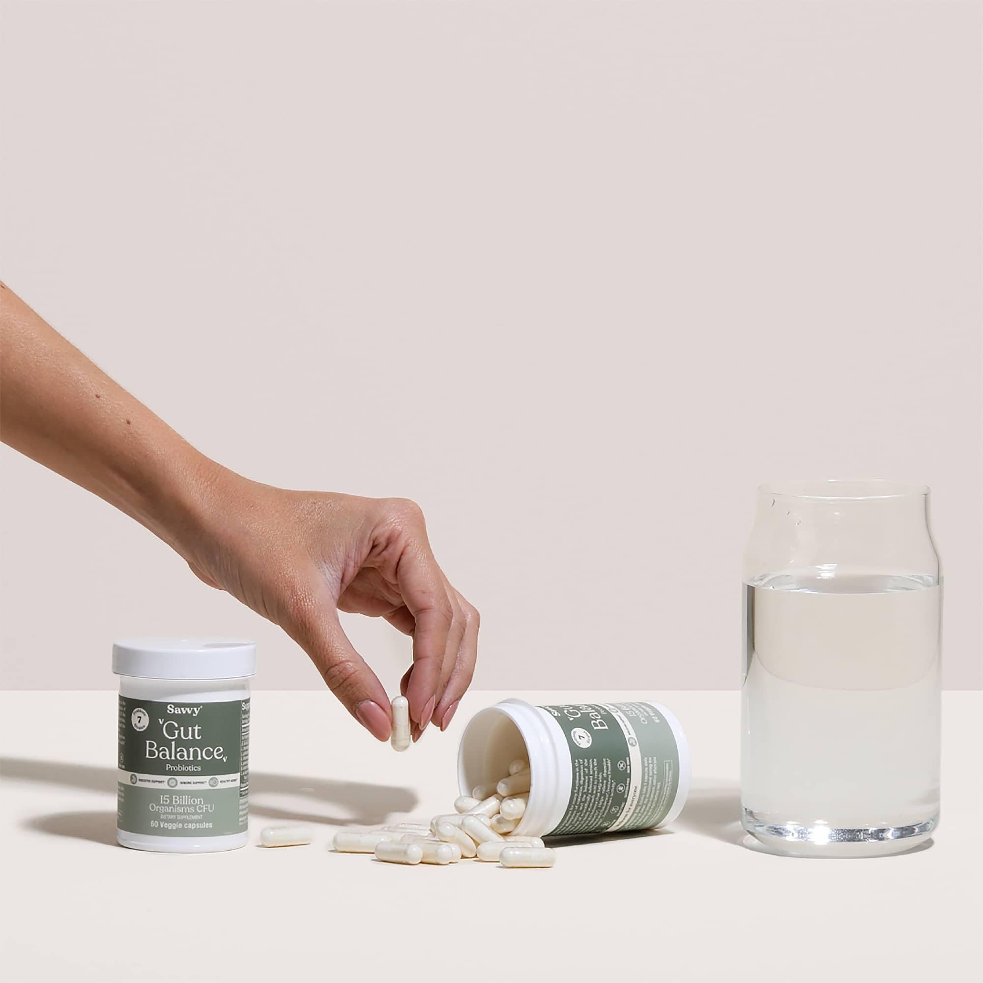 Bottle with soft lighting evoking skin clarity and aging support