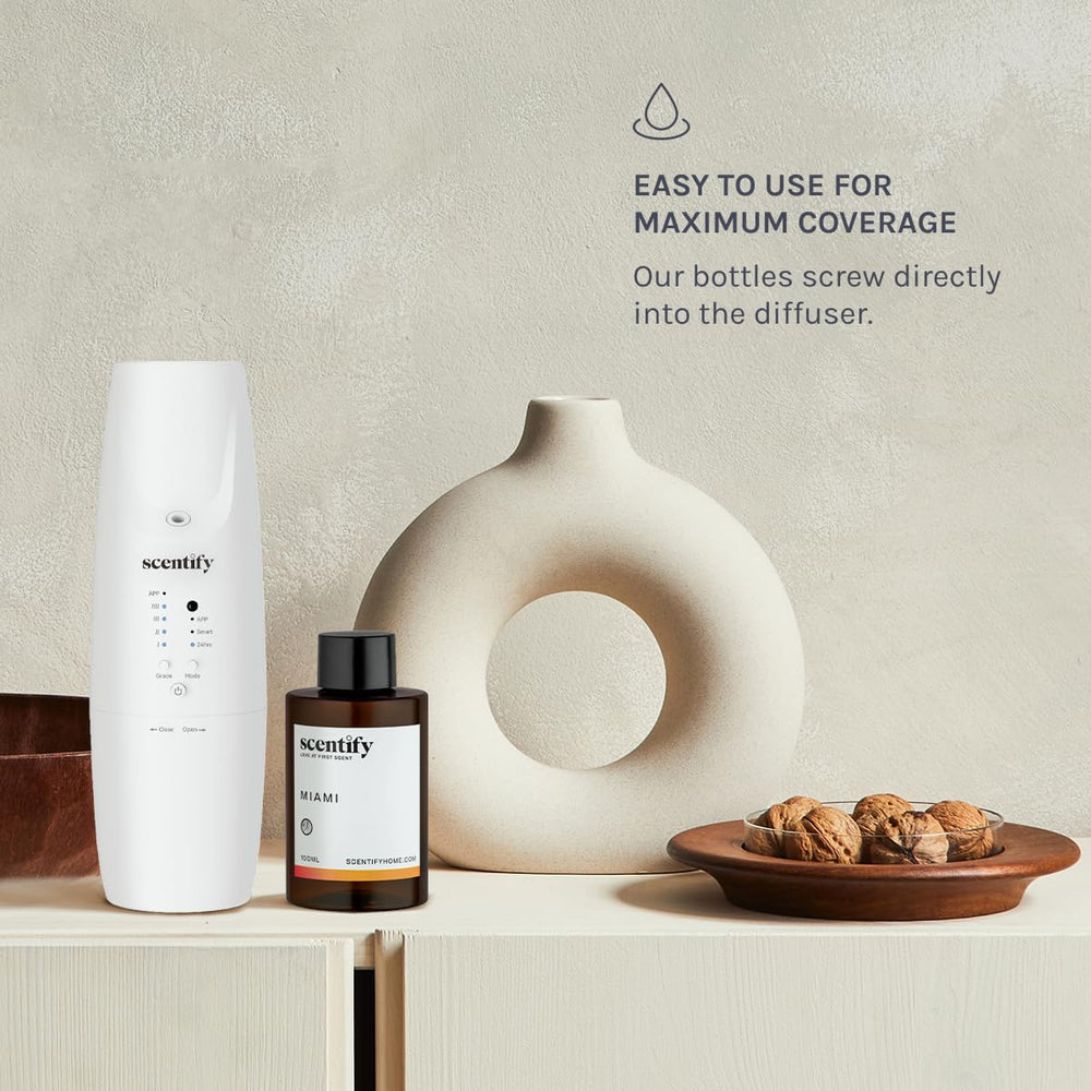 Scentify Miami aromatherapy refill beside a diffuser boosts mood and focus.