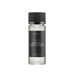 Scentiment Vanilla Macadamia bottle releases warm, inviting fragrance for cozy spaces.