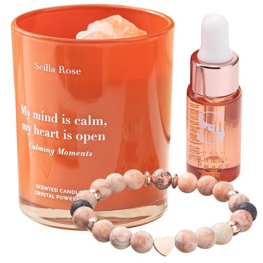 Scilla ROSE crystal infused candle glows softly with calming aroma