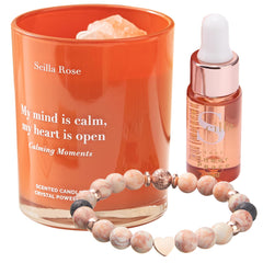 Scilla ROSE crystal infused candle glows softly with calming aroma