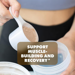 Sculpt Nation chocolate protein shake in a glass highlighting smooth flavor and mixability.