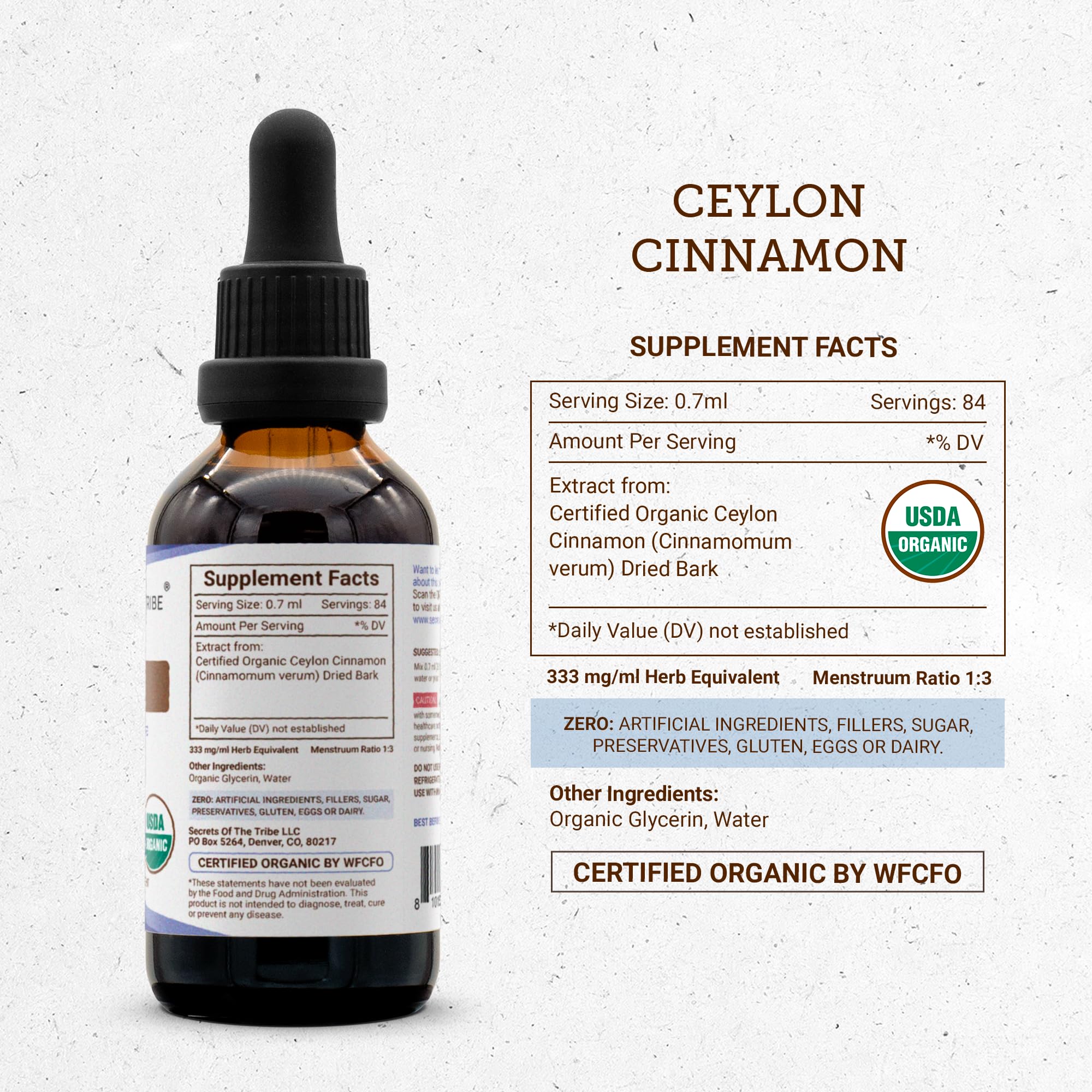 Dropper filled with Secrets of the Tribe cinnamon tincture for recipes