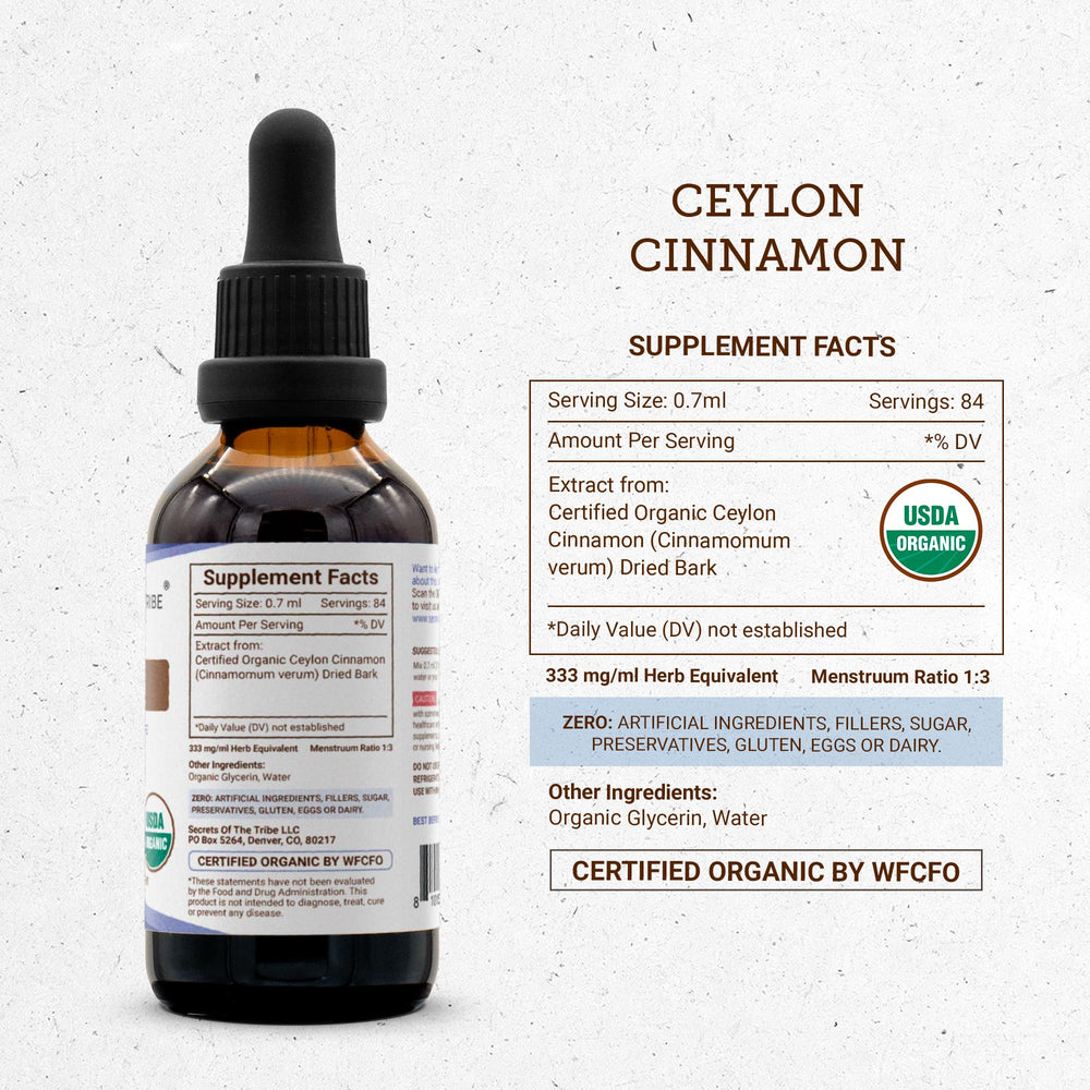 Dropper filled with Secrets of the Tribe cinnamon tincture for recipes