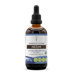 Secrets of the Tribe Neem bottle pour — alcohol-free high-potency drops for daily use.