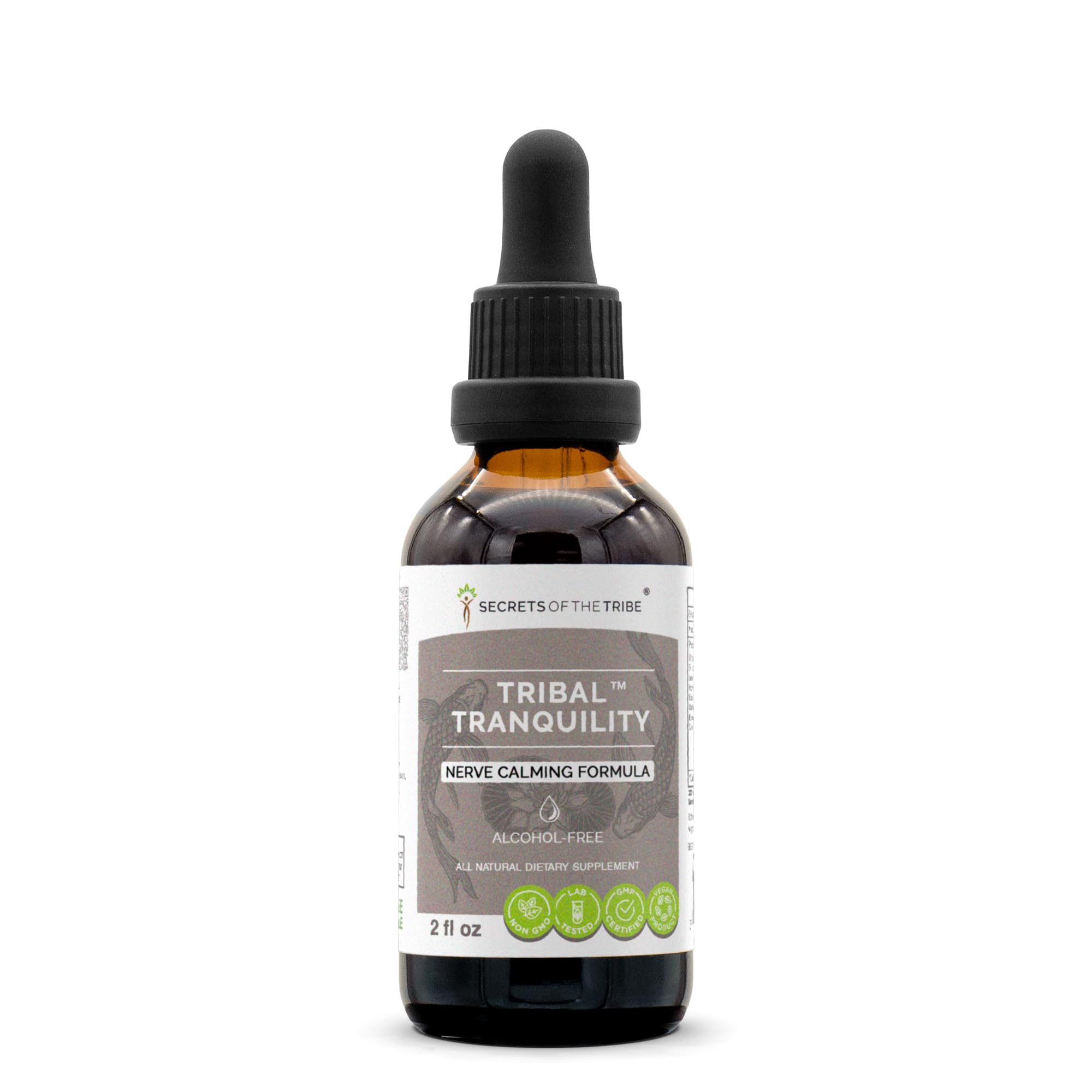 Secrets of the Tribe Tribal Tranquility bottle on a wooden table for calm support.