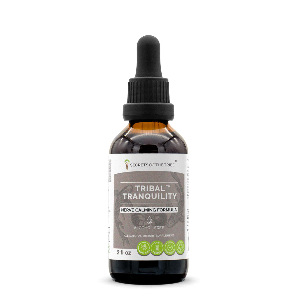 Secrets of the Tribe Tribal Tranquility bottle on a wooden table for calm support.