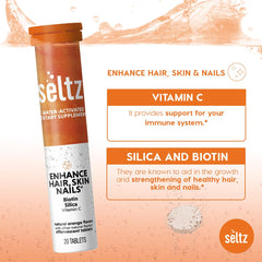 Seltz Enhance dissolving tablets in water close-up with sparkle.