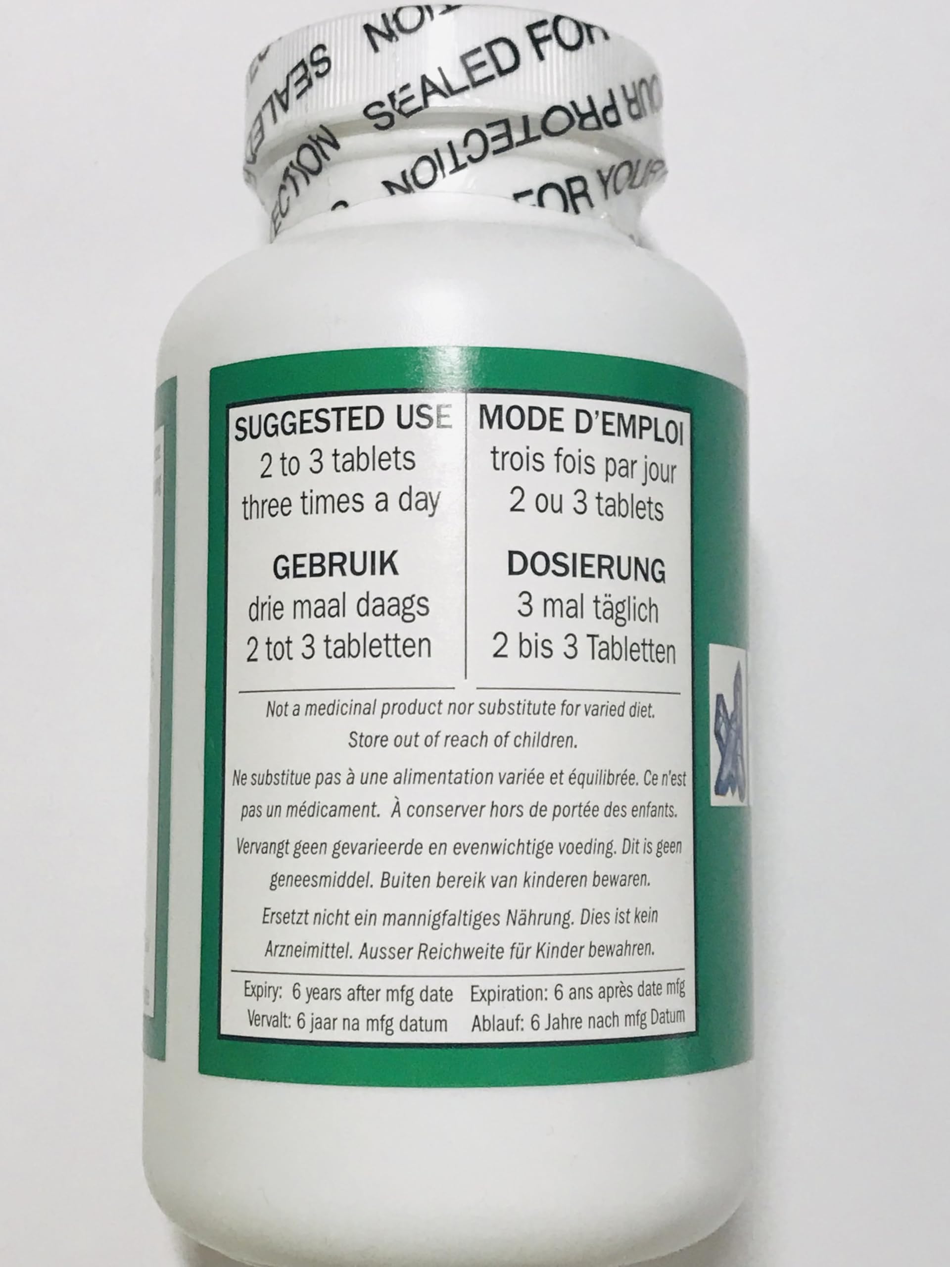 Seven Forests Tang-kuei 18 bottle closeup highlights herbal blend for energy and balance.