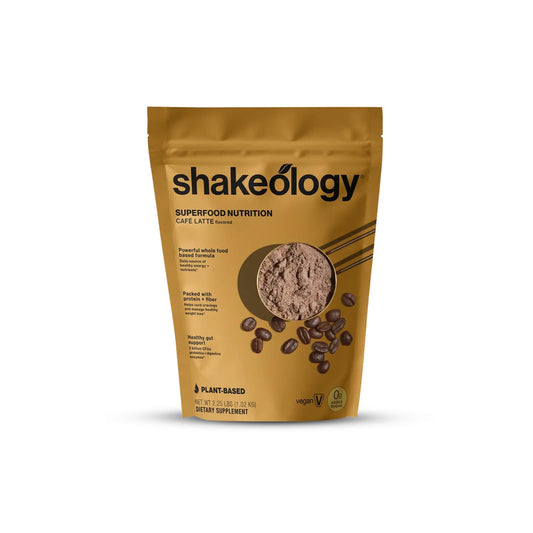 Shakeology Cafe Latte bottle pour: 0g added sugar supports mindful weight management and sustained energy.