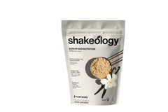 Shakeology Vanilla plant-based protein powder bottle highlights gluten-free nutrition.