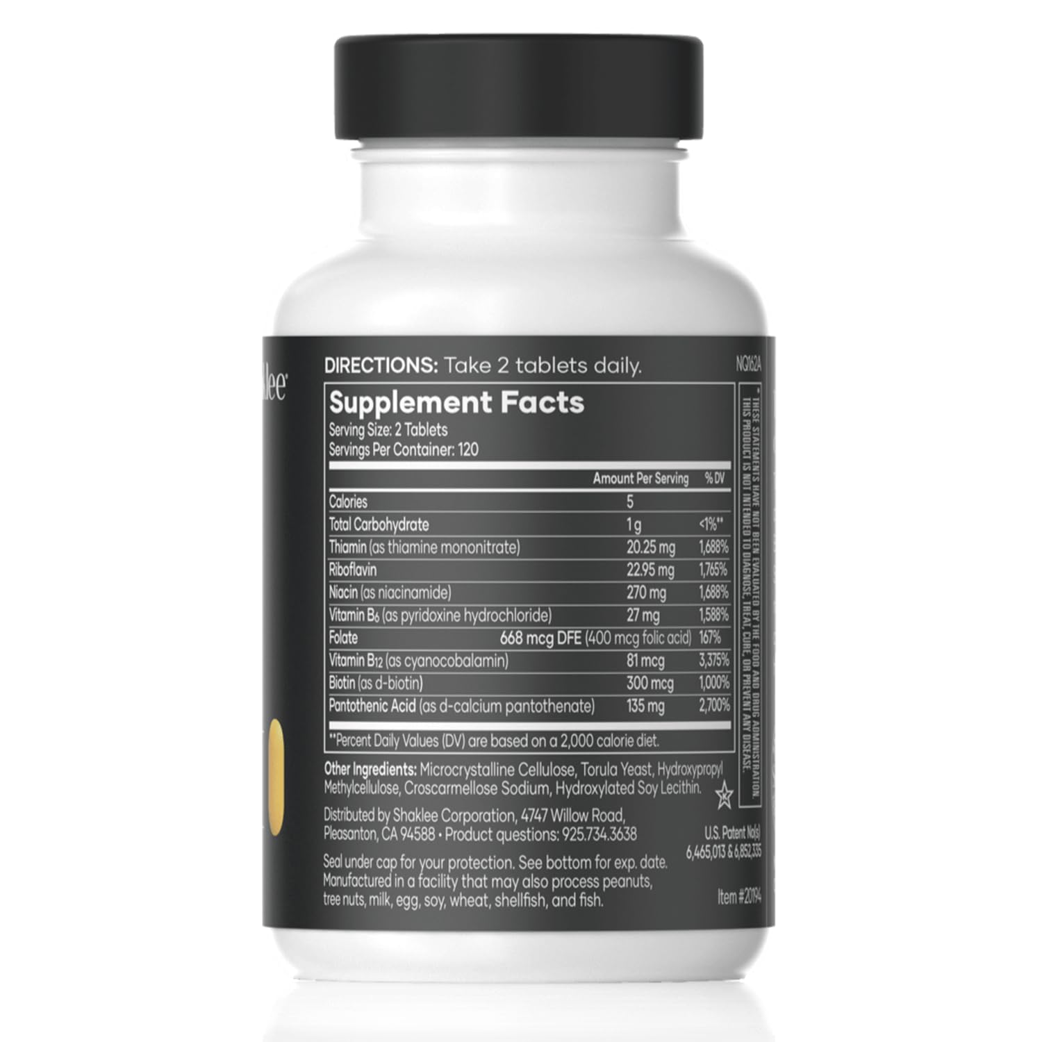 Shaklee B-Complex tablets close-up highlighting compact daily supplement.