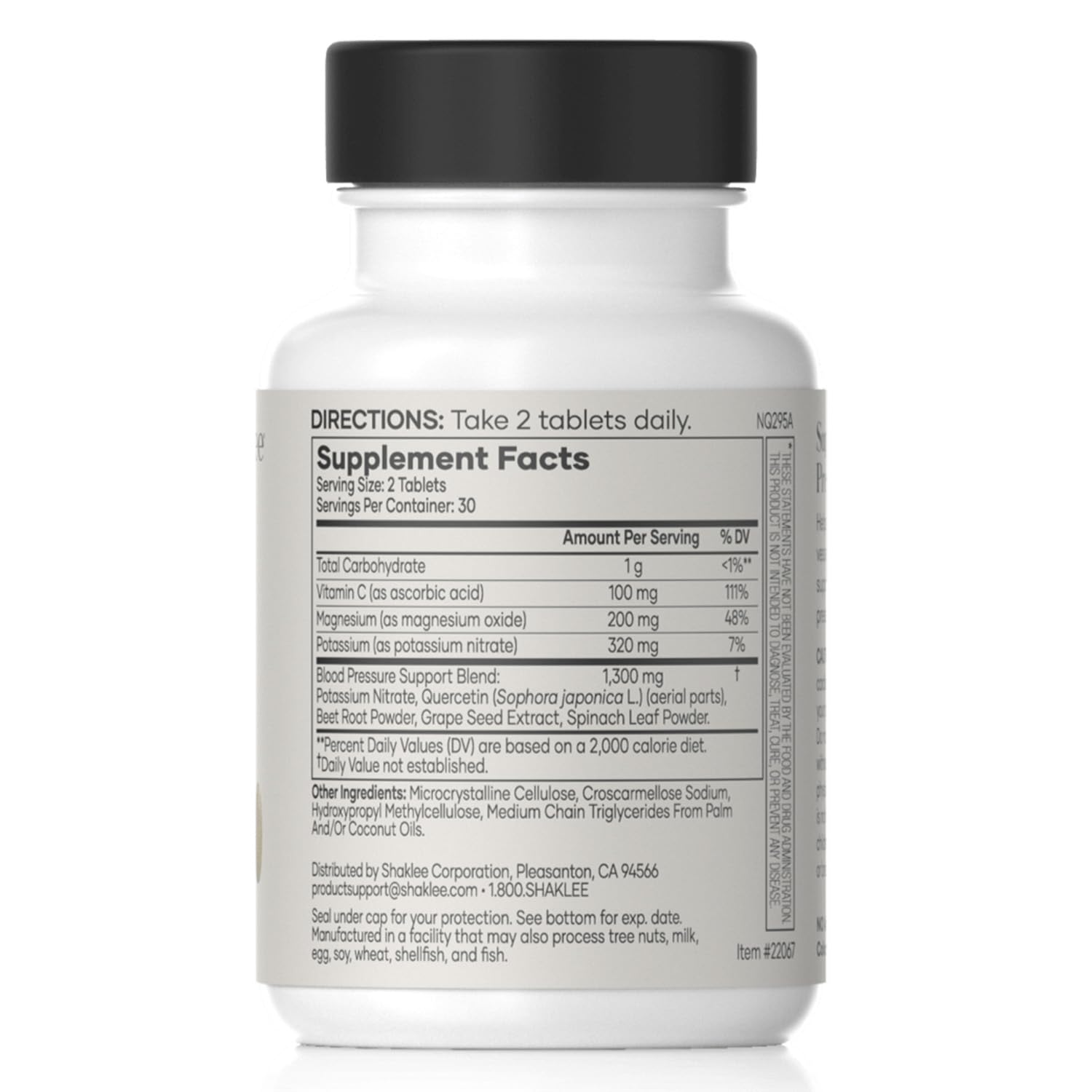 Shaklee Blood Pressure tablets closeup for convenient supplementation.