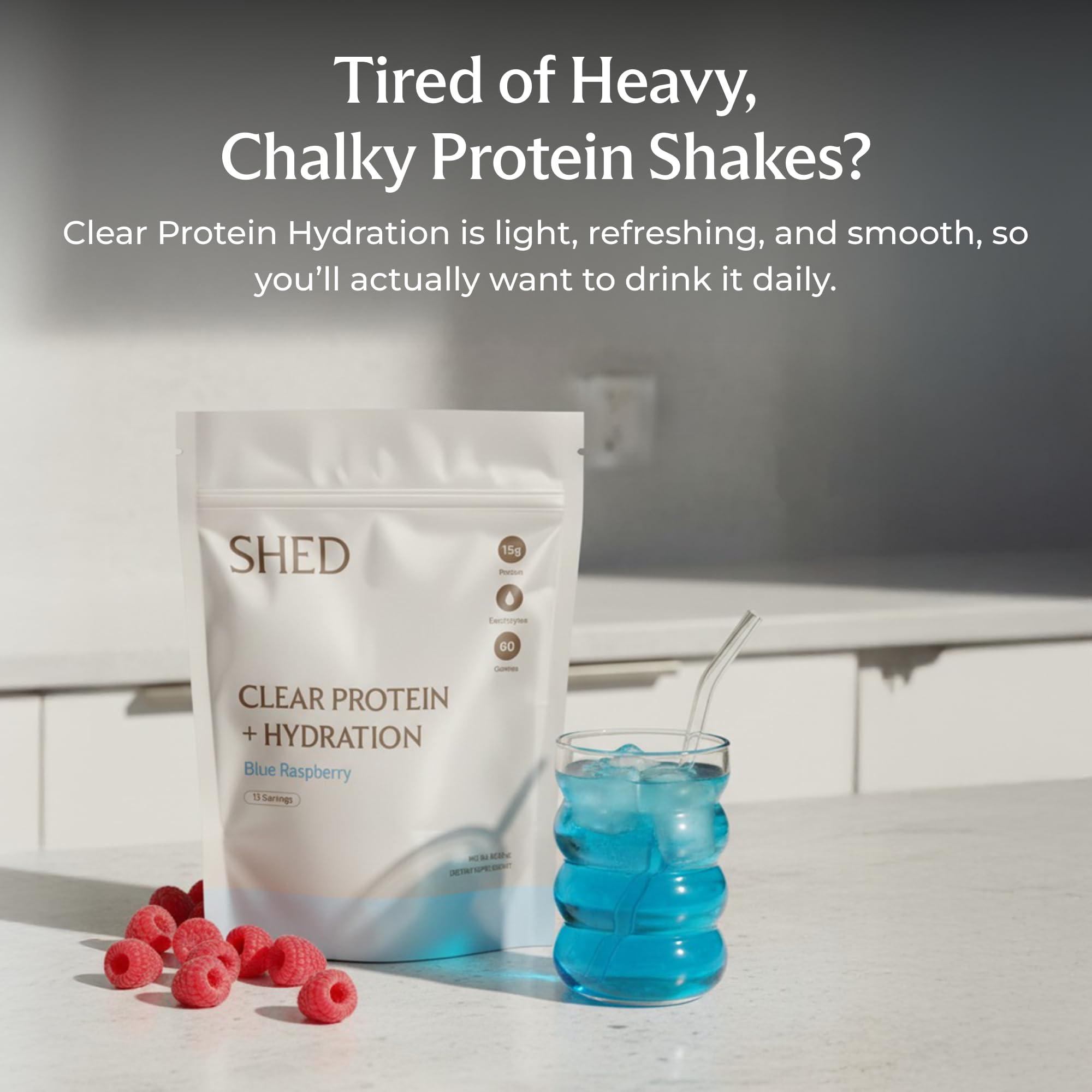 Close-up of Shed Clear Protein scoop highlighting lactose-free, low-calorie formula.