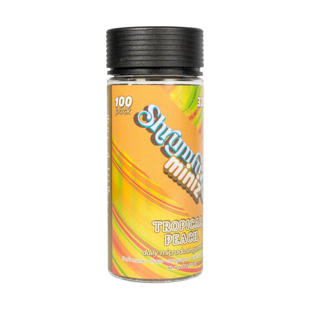 Shrumfuzed Miniz gummy close-up shows texture and vibrant tropical peach flavor