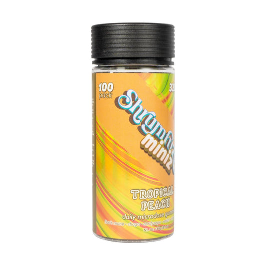 Shrumfuzed Miniz gummy close-up shows texture and vibrant tropical peach flavor