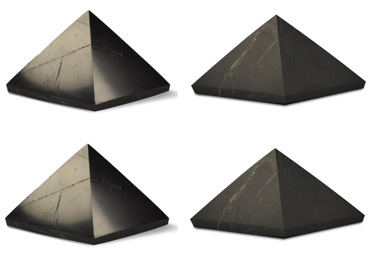 Shungite World 4pcs pyramids polished 50 mm set lends sleek energy balance in any space.
