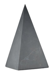 Shungite World authentic tall pyramid 100mm, front view, energizes spaces with natural protective calm.