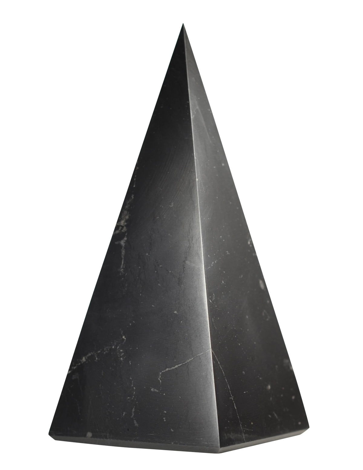 Shungite World authentic tall pyramid 60mm on desk for grounding and focus.