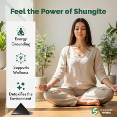 Shungite World pyramid on desk provides grounding and device shielding.