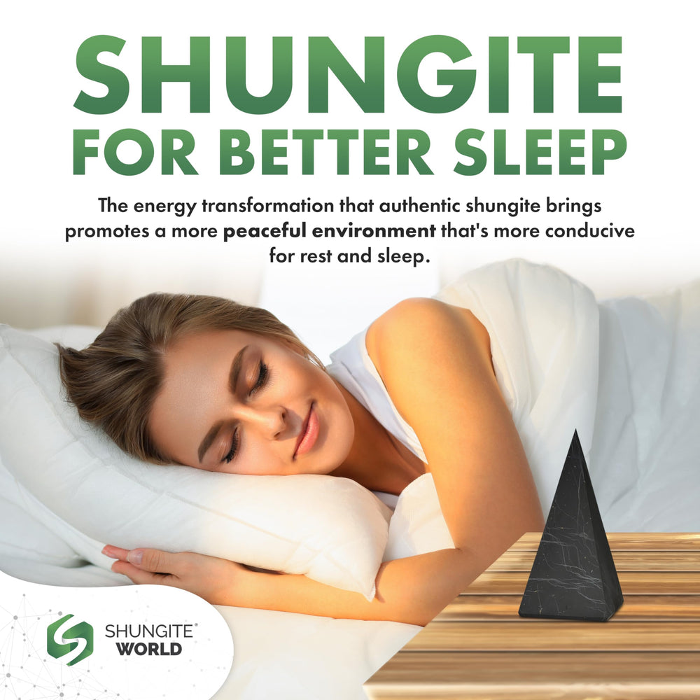 Shungite World pyramid on desk with laptop, helps focus while keeping energy clear.