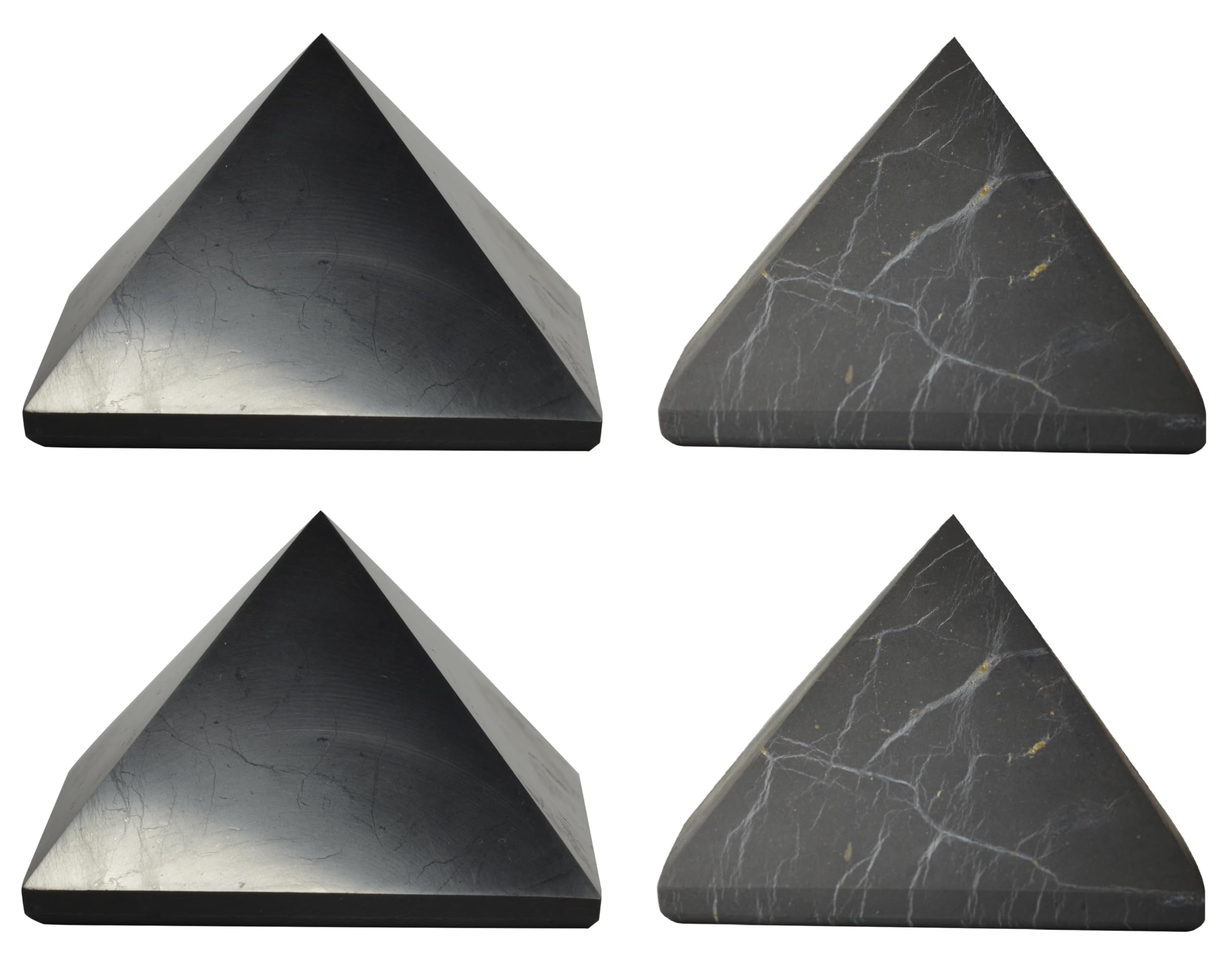 Shungite World polished pyramids 70mm on desk for focused energy protection.