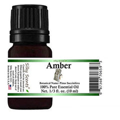 Silky Scents Amber Essential Oil bottle with a dropper for precise pours