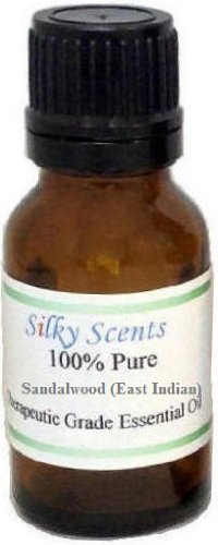 Silky Scents sandalwood essential oil bottle with pour cap for easy diffusion in blends.
