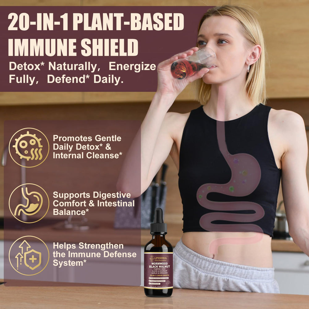 A glass of water with SKLIA liposomal wormwood drops ready to mix.