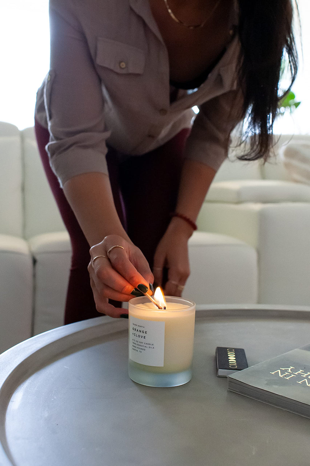 Slow North candle in a glass jar demonstrates premium, hand-poured quality from a USA-based maker.
