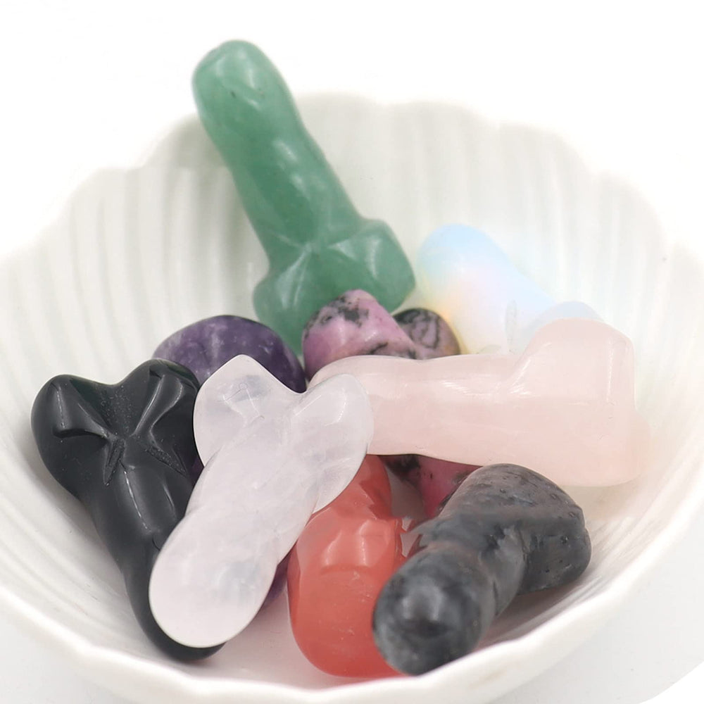 SLWIOYO watermelon red penis-shaped crystal figure adds playful charm to home workspace.