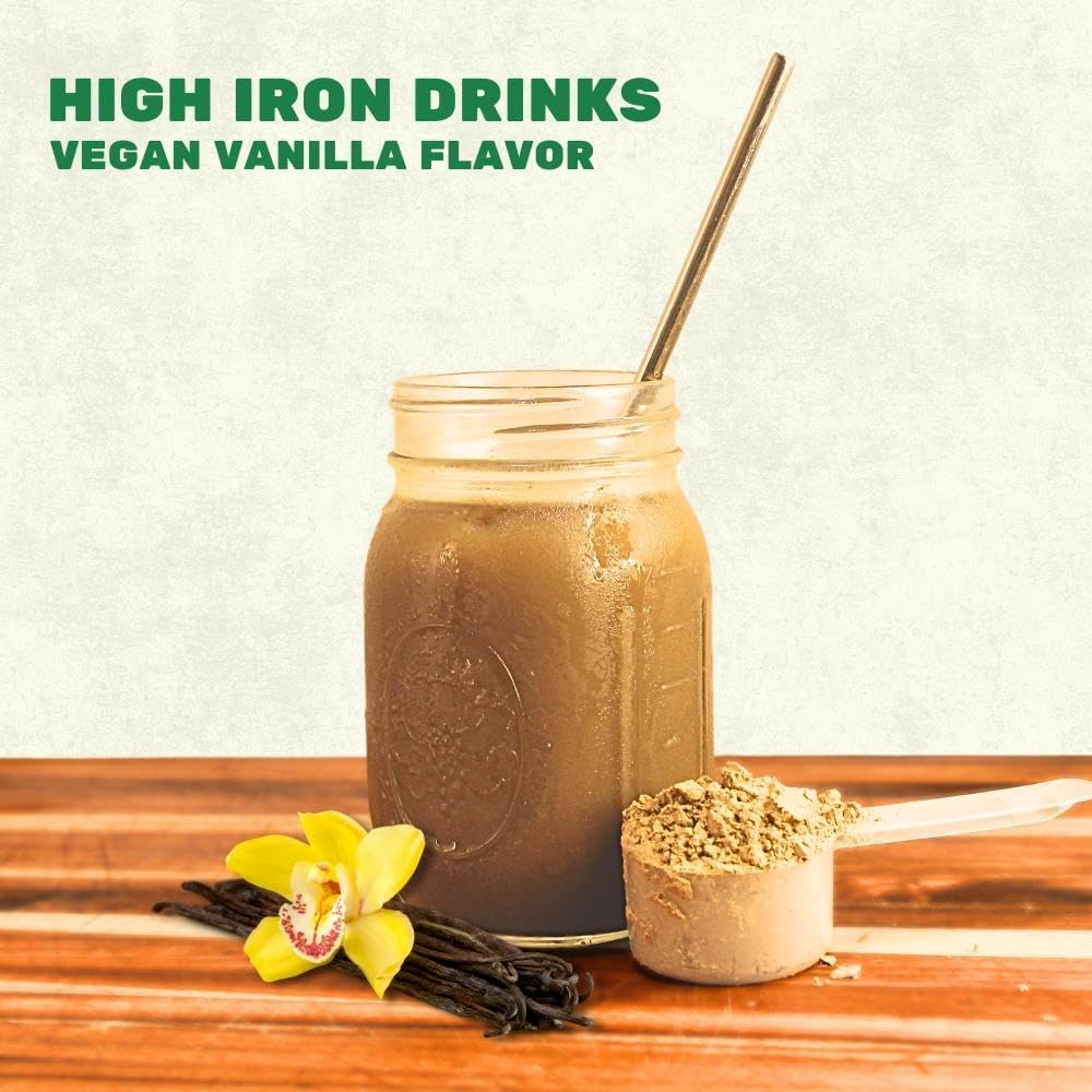 Smart Eats Iron Powder being poured into a glass for smooth mixing.
