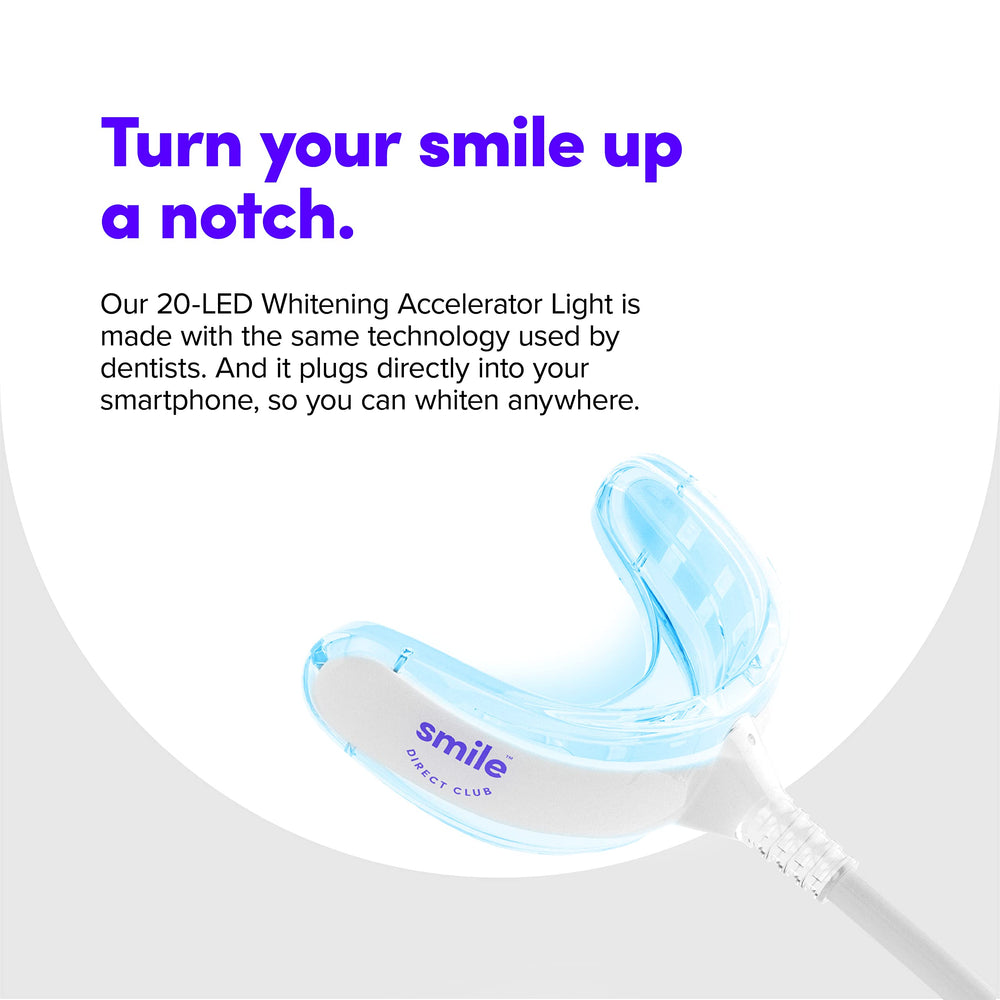 At-home whitening session using SmileDirectClub LED light.
