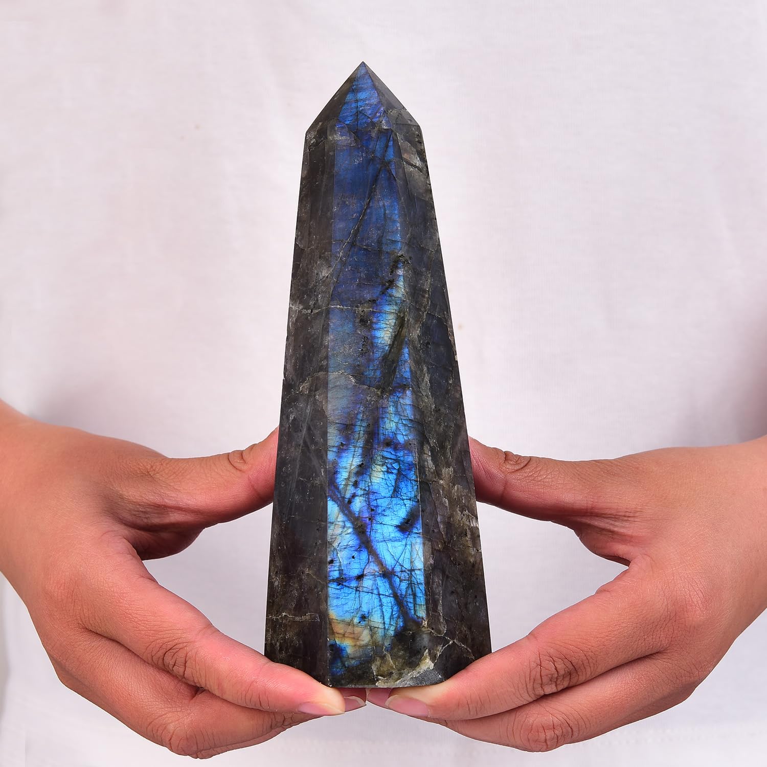 SMOHEAL crystal obelisk apex concentrates energy for tranquil workspace balance.