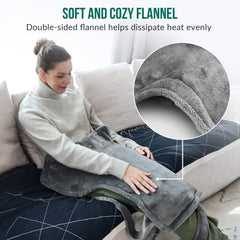 Snailax wearable wrap worn at desk for hands-free heat therapy.